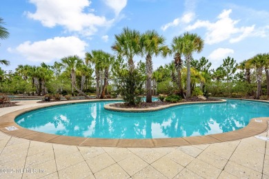 This immaculate home built in 2021 is MOVE IN READY and offers on Golf Club At South Hampton in Florida - for sale on GolfHomes.com, golf home, golf lot