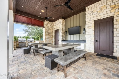 This immaculate home built in 2021 is MOVE IN READY and offers on Golf Club At South Hampton in Florida - for sale on GolfHomes.com, golf home, golf lot