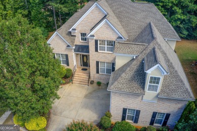 WELCOME HOME!! Experience luxury and security in this on Eagles Landing Country Club in Georgia - for sale on GolfHomes.com, golf home, golf lot