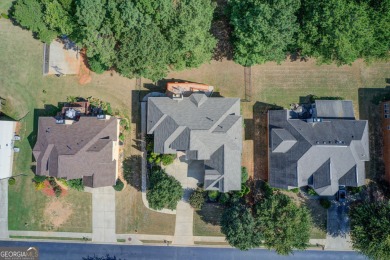 WELCOME HOME!! Experience luxury and security in this on Eagles Landing Country Club in Georgia - for sale on GolfHomes.com, golf home, golf lot