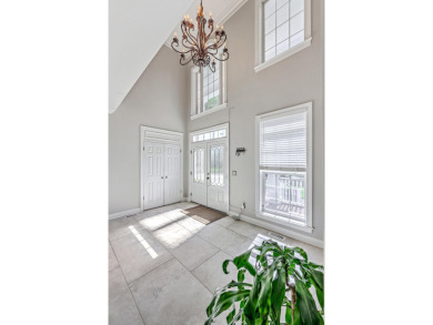 Welcome to your dream home! Nestled in the quiet on Dunes West Golf Club in South Carolina - for sale on GolfHomes.com, golf home, golf lot