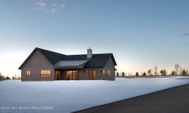 This new construction home nestled on a Teton Reserve corner lot on Teton Reserve in Idaho - for sale on GolfHomes.com, golf home, golf lot