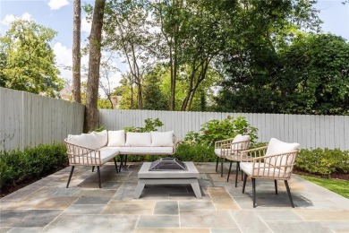 Beautifully updated and full of charm, this home is nestled in on Bobby Jones Golf Club in Georgia - for sale on GolfHomes.com, golf home, golf lot