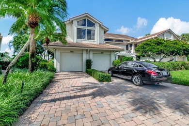 Charter Cay 2nd floor club villa with magnificent water and golf on Boca West Golf and Country Club in Florida - for sale on GolfHomes.com, golf home, golf lot