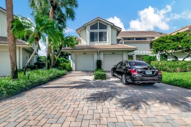 Charter Cay 2nd floor club villa with magnificent water and golf on Boca West Golf and Country Club in Florida - for sale on GolfHomes.com, golf home, golf lot