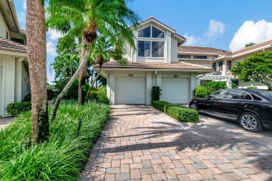 Charter Cay 2nd floor club villa with magnificent water and golf on Boca West Golf and Country Club in Florida - for sale on GolfHomes.com, golf home, golf lot