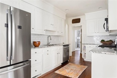 Beautifully updated and full of charm, this home is nestled in on Bobby Jones Golf Club in Georgia - for sale on GolfHomes.com, golf home, golf lot