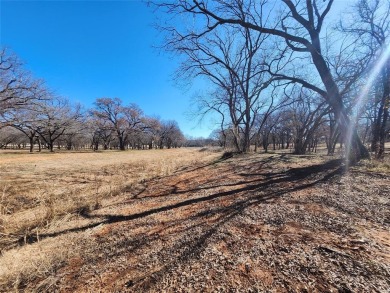 Nice half acre building site lot with mature oak trees to build on Nocona Hills Golf Course in Texas - for sale on GolfHomes.com, golf home, golf lot