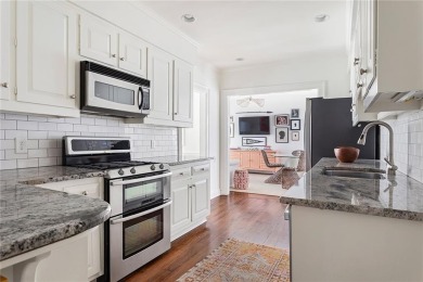 Beautifully updated and full of charm, this home is nestled in on Bobby Jones Golf Club in Georgia - for sale on GolfHomes.com, golf home, golf lot