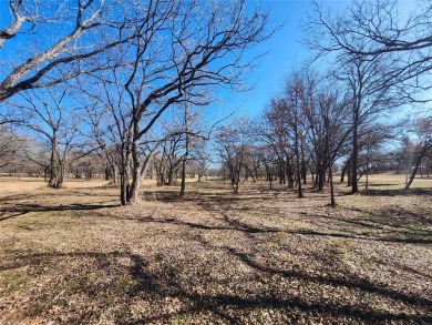 Nice half acre building site lot with mature oak trees to build on Nocona Hills Golf Course in Texas - for sale on GolfHomes.com, golf home, golf lot