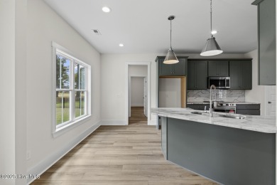 Beautiful new construction home located on the 8th hole of Rock on Rock Creek Country Club in North Carolina - for sale on GolfHomes.com, golf home, golf lot