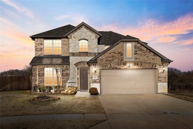 This gorgeous four-bedroom, 2.5-bath, two-story home is in a on The Golf Club At Champions Circle in Texas - for sale on GolfHomes.com, golf home, golf lot