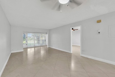 Beautifully updated and spacious 55+ ground-floor condo with no on Villa Del Ray Golf Club in Florida - for sale on GolfHomes.com, golf home, golf lot
