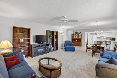 Located in the desirable Highgate F neighborhood of Kings Point on Falcon Watch Golf Club in Florida - for sale on GolfHomes.com, golf home, golf lot