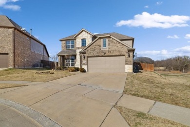 This gorgeous four-bedroom, 2.5-bath, two-story home is in a on The Golf Club At Champions Circle in Texas - for sale on GolfHomes.com, golf home, golf lot