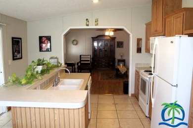 **Charming Waterfront Retreat in Florida!** NEW ROOF 2025! on Cypresswood Golf and Country Club in Florida - for sale on GolfHomes.com, golf home, golf lot
