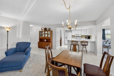Located in the desirable Highgate F neighborhood of Kings Point on Falcon Watch Golf Club in Florida - for sale on GolfHomes.com, golf home, golf lot