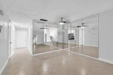 Beautifully updated and spacious 55+ ground-floor condo with no on Villa Del Ray Golf Club in Florida - for sale on GolfHomes.com, golf home, golf lot
