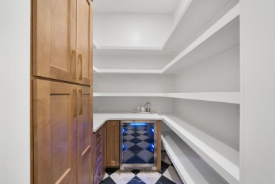 This stunning NEW CONSTRUCTION home Wild Heron is a single level on Sharks Tooth Golf Club in Florida - for sale on GolfHomes.com, golf home, golf lot