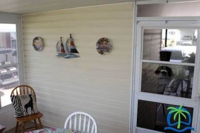 **Charming Waterfront Retreat in Florida!** NEW ROOF 2025! on Cypresswood Golf and Country Club in Florida - for sale on GolfHomes.com, golf home, golf lot