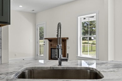 Beautiful new construction home located on the 8th hole of Rock on Rock Creek Country Club in North Carolina - for sale on GolfHomes.com, golf home, golf lot