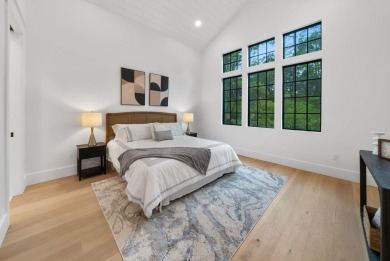 This stunning NEW CONSTRUCTION home Wild Heron is a single level on Sharks Tooth Golf Club in Florida - for sale on GolfHomes.com, golf home, golf lot