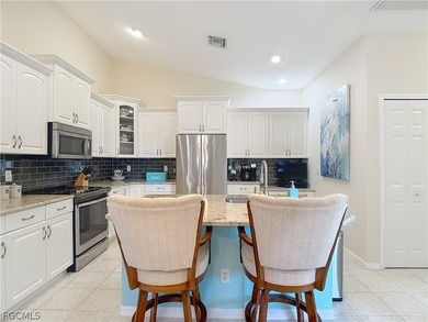 Enjoy easy maintenance living with no carpet, featuring tile and on Herons Glen Golf and Country Club in Florida - for sale on GolfHomes.com, golf home, golf lot