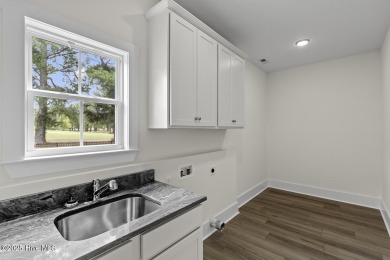 Beautiful new construction home located on the 8th hole of Rock on Rock Creek Country Club in North Carolina - for sale on GolfHomes.com, golf home, golf lot