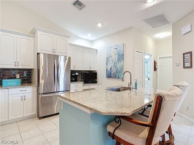 Enjoy easy maintenance living with no carpet, featuring tile and on Herons Glen Golf and Country Club in Florida - for sale on GolfHomes.com, golf home, golf lot