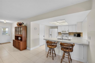 Located in the desirable Highgate F neighborhood of Kings Point on Falcon Watch Golf Club in Florida - for sale on GolfHomes.com, golf home, golf lot