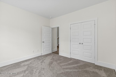 Beautiful new construction home located on the 8th hole of Rock on Rock Creek Country Club in North Carolina - for sale on GolfHomes.com, golf home, golf lot