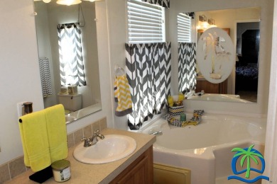 **Charming Waterfront Retreat in Florida!** NEW ROOF 2025! on Cypresswood Golf and Country Club in Florida - for sale on GolfHomes.com, golf home, golf lot