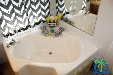 **Charming Waterfront Retreat in Florida!** NEW ROOF 2025! on Cypresswood Golf and Country Club in Florida - for sale on GolfHomes.com, golf home, golf lot