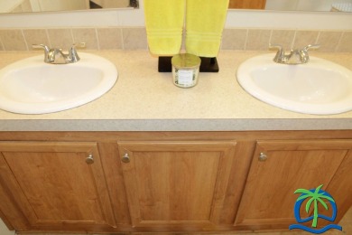 **Charming Waterfront Retreat in Florida!** NEW ROOF 2025! on Cypresswood Golf and Country Club in Florida - for sale on GolfHomes.com, golf home, golf lot