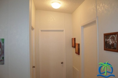 **Charming Waterfront Retreat in Florida!** NEW ROOF 2025! on Cypresswood Golf and Country Club in Florida - for sale on GolfHomes.com, golf home, golf lot