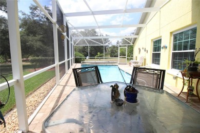 This beautiful pool home is located in a desirable area in the on Oakwood Golf Club in Florida - for sale on GolfHomes.com, golf home, golf lot