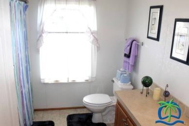 **Charming Waterfront Retreat in Florida!** NEW ROOF 2025! on Cypresswood Golf and Country Club in Florida - for sale on GolfHomes.com, golf home, golf lot