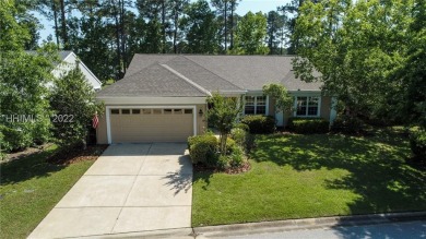 Darling Dogwood with hard-top screened porch overlooking 15th on Hidden Cypress Golf Club in South Carolina - for sale on GolfHomes.com, golf home, golf lot