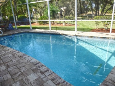 This beautiful pool home is located in a desirable area in the on Oakwood Golf Club in Florida - for sale on GolfHomes.com, golf home, golf lot