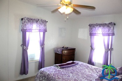 **Charming Waterfront Retreat in Florida!** NEW ROOF 2025! on Cypresswood Golf and Country Club in Florida - for sale on GolfHomes.com, golf home, golf lot