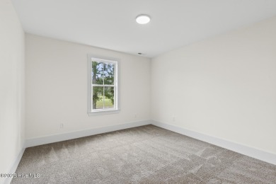 Beautiful new construction home located on the 8th hole of Rock on Rock Creek Country Club in North Carolina - for sale on GolfHomes.com, golf home, golf lot