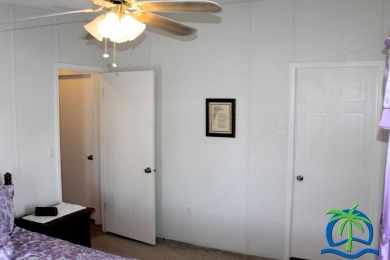**Charming Waterfront Retreat in Florida!** NEW ROOF 2025! on Cypresswood Golf and Country Club in Florida - for sale on GolfHomes.com, golf home, golf lot
