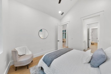 This stunning NEW CONSTRUCTION home Wild Heron is a single level on Sharks Tooth Golf Club in Florida - for sale on GolfHomes.com, golf home, golf lot