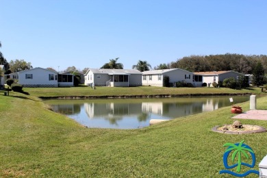 **Charming Waterfront Retreat in Florida!** NEW ROOF 2025! on Cypresswood Golf and Country Club in Florida - for sale on GolfHomes.com, golf home, golf lot