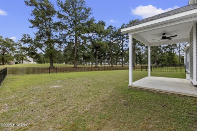 Beautiful new construction home located on the 8th hole of Rock on Rock Creek Country Club in North Carolina - for sale on GolfHomes.com, golf home, golf lot