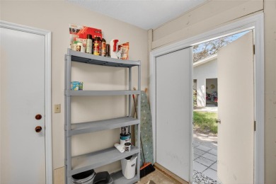 Located in the desirable Highgate F neighborhood of Kings Point on Falcon Watch Golf Club in Florida - for sale on GolfHomes.com, golf home, golf lot