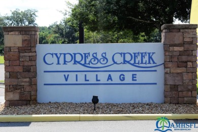 **Charming Waterfront Retreat in Florida!** NEW ROOF 2025! on Cypresswood Golf and Country Club in Florida - for sale on GolfHomes.com, golf home, golf lot