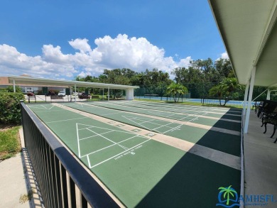 **Charming Waterfront Retreat in Florida!** NEW ROOF 2025! on Cypresswood Golf and Country Club in Florida - for sale on GolfHomes.com, golf home, golf lot