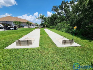 **Charming Waterfront Retreat in Florida!** NEW ROOF 2025! on Cypresswood Golf and Country Club in Florida - for sale on GolfHomes.com, golf home, golf lot