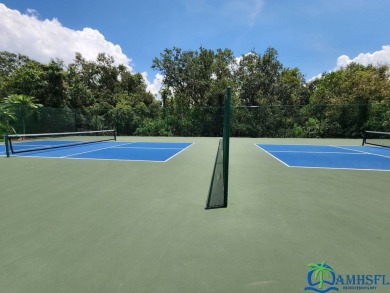**Charming Waterfront Retreat in Florida!** NEW ROOF 2025! on Cypresswood Golf and Country Club in Florida - for sale on GolfHomes.com, golf home, golf lot